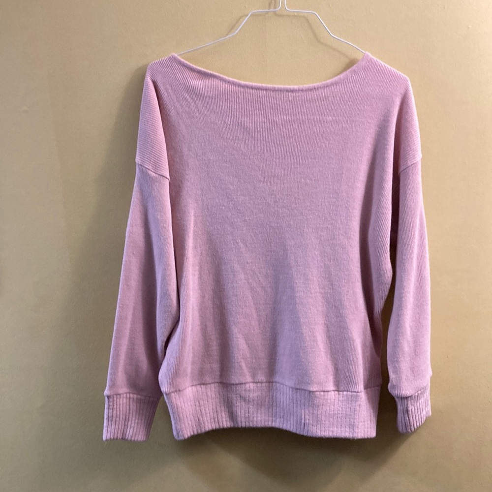 The Rock N Rev light pink sweater